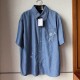 Replica Louis Vuitton Embroidered Chambray Short-Sleeved Shirt Replica Louis Vuitton Embroidered Chambray Short-Sleeved Shirt front view - 2025 luxury summer collection