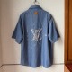 Replica Louis Vuitton Embroidered Chambray Short-Sleeved Shirt Replica Louis Vuitton Embroidered Chambray Short-Sleeved Shirt front view - 2025 luxury summer collection
